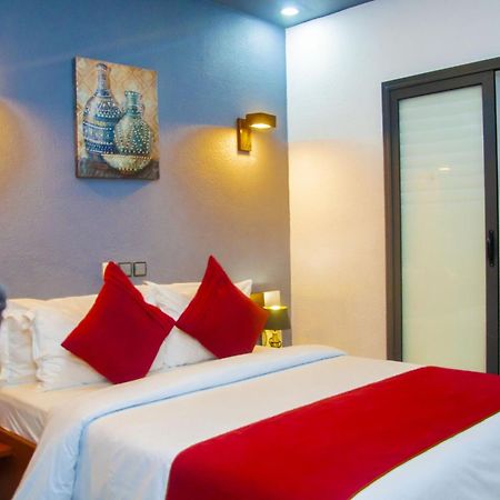 Hotel La Casa Cielo Котону Экстерьер фото
