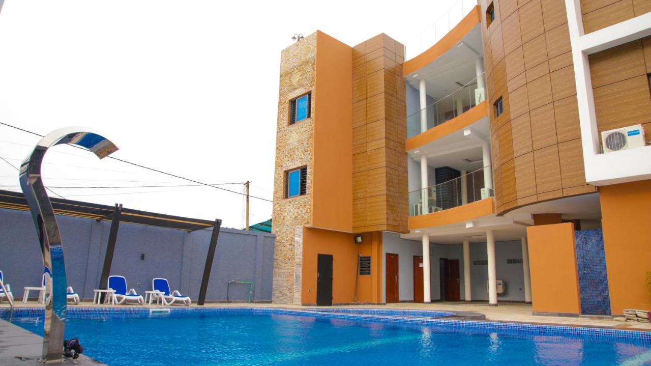 Hotel La Casa Cielo Котону Экстерьер фото