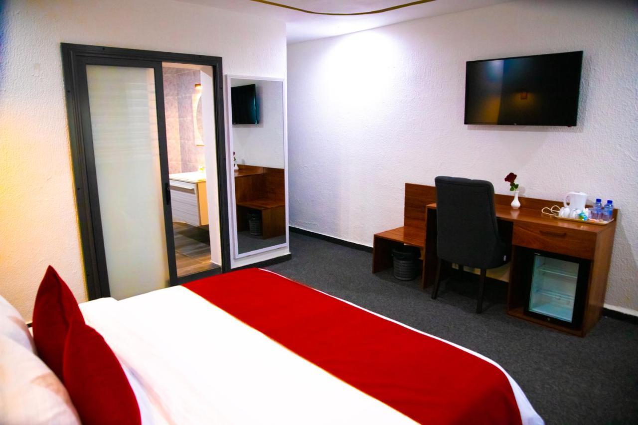 Hotel La Casa Cielo Котону Экстерьер фото