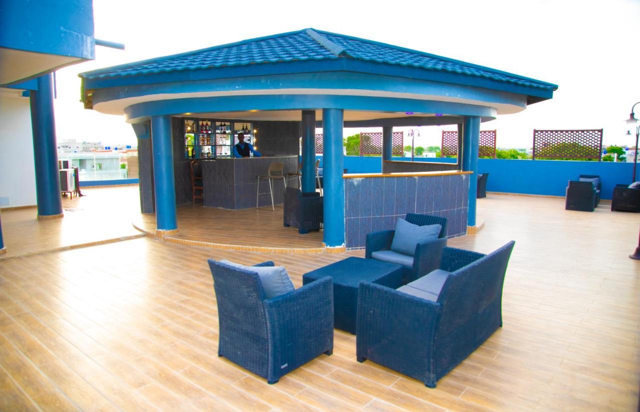 Hotel La Casa Cielo Котону Экстерьер фото