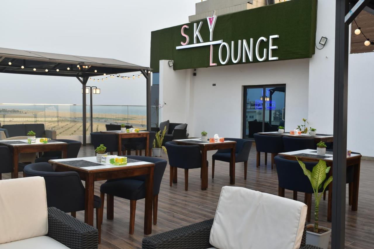 Hotel La Casa Cielo Котону Экстерьер фото